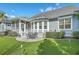 Landscaped backyard with lush lawn, patio and putting green, great for outdoor activities at 3697 Stamler Ct, Mount Pleasant, SC 29466