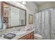 Bathroom with a large mirror, a vanity with granite countertop, and a shower with tub at 3697 Stamler Ct, Mount Pleasant, SC 29466