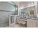 Modern bathroom with a large tile shower, dual vanities, and a makeup area at 3697 Stamler Ct, Mount Pleasant, SC 29466