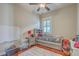 bedroom with twin bed features hardwood floors, natural light, and a ceiling fan at 3697 Stamler Ct, Mount Pleasant, SC 29466