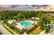 Stunning aerial view of the community pool and clubhouse, ideal for relaxation and socializing at 3697 Stamler Ct, Mount Pleasant, SC 29466