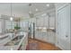 Bright kitchen featuring granite counters, stainless appliances, and custom white cabinets at 3697 Stamler Ct, Mount Pleasant, SC 29466