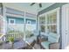 Cozy screened-in porch with comfortable seating, perfect for relaxing outdoors at 3697 Stamler Ct, Mount Pleasant, SC 29466