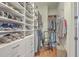 Well-organized walk-in closet features custom shelves, drawers, and a ladder for extra storage at 3697 Stamler Ct, Mount Pleasant, SC 29466