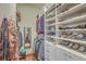 Spacious walk-in closet with custom shelving to keep clothing and shoes organized at 3697 Stamler Ct, Mount Pleasant, SC 29466