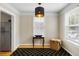 Well-lit dining area featuring hardwood floors, a pendant light, and neutral walls at 3728 Tim St, North Charleston, SC 29405