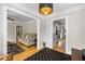 Open-concept living area featuring hardwood floors, neutral walls, and access to the kitchen at 3728 Tim St, North Charleston, SC 29405