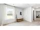 Hallway with a storage bench, coat hooks, and natural light from a large window, adding a functional and bright space at 384 Willows Crescent Dr, Moncks Corner, SC 29461