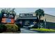 Commercial building housing Delta Pharmacy with a prominent sign, landscaping, and accessible parking for customers at 406 Peachwood Ln, Moncks Corner, SC 29461
