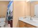 Cozy bathroom featuring a toilet, a shower with a colorful curtain, and a vanity with sink at 407 Burton Ave, Summerville, SC 29485