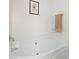 Modern bathtub with a sleek design, providing a relaxing space for soaking and unwinding at 407 Burton Ave, Summerville, SC 29485