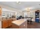 Open kitchen with an island that connects to the living room and dining area with modern décor at 407 Burton Ave, Summerville, SC 29485
