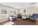 Bright and spacious living room featuring stylish furniture, hardwood floors, and plenty of natural light at 407 Burton Ave, Summerville, SC 29485