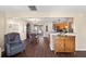 Inviting space with hardwood floors, seamless flow to dining area, and plenty of natural light at 407 Burton Ave, Summerville, SC 29485