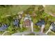 Stunning aerial view of a home with a pool, putting green, and manicured landscaping in a desirable neighborhood at 4217 Sawgrass Dr, Charleston, SC 29420