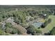 Aerial view showcasing tennis courts, clubhouse, and community amenities at 4217 Sawgrass Dr, Charleston, SC 29420
