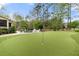 Spacious backyard with a swimming pool and putting green, perfect for outdoor activities and recreation at 4217 Sawgrass Dr, Charleston, SC 29420