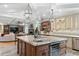 Spacious kitchen with granite countertops, large island, stainless steel appliances, and an open view to living room at 4217 Sawgrass Dr, Charleston, SC 29420