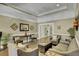 Comfortable lobby featuring neutral paint, wood-look flooring, and seating for guests at 4217 Sawgrass Dr, Charleston, SC 29420