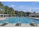 Large swimming pool with lane dividers and lifeguard stand at 4217 Sawgrass Dr, Charleston, SC 29420