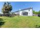 Expansive backyard featuring lush green grass and mature tree, perfect for outdoor activities and relaxation at 5007 Ballantine Dr, Summerville, SC 29485