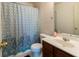 Bathroom with a decorative blue shower curtain, toilet and modern vanity at 5007 Ballantine Dr, Summerville, SC 29485