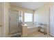 Bright bathroom showcasing a separate tub and walk-in shower at 5007 Ballantine Dr, Summerville, SC 29485