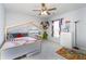 A bedroom features playful decor, a wooden bed frame, and carpet at 5007 Ballantine Dr, Summerville, SC 29485