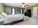 Bedroom with carpet, ceiling fan, and dark-colored walls at 5007 Ballantine Dr, Summerville, SC 29485