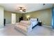 Bright bedroom with carpet, ceiling fan, and neutral-colored walls at 5007 Ballantine Dr, Summerville, SC 29485