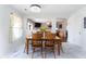 Bright dining room with marble pattern flooring and vintage wooden table at 5007 Ballantine Dr, Summerville, SC 29485