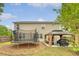 Spacious backyard with a trampoline, gazebo, and plenty of room for outdoor activities at 708 Professor Dr, Ladson, SC 29456