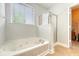 Relaxing bathroom with soaking tub and separate shower at 708 Professor Dr, Ladson, SC 29456