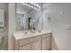 Bright bathroom featuring double sinks, and updated lighting at 708 Professor Dr, Ladson, SC 29456