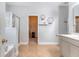 Bathroom showcasing shower, bathtub, and walk in closet at 708 Professor Dr, Ladson, SC 29456