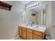 Bathroom featuring a double vanity, a large mirror, and decorative storage at 708 Professor Dr, Ladson, SC 29456