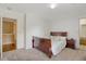 Bedroom featuring a dark wood bedroom set, neutral carpet and white walls at 708 Professor Dr, Ladson, SC 29456