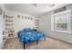 Vibrant bedroom with shelving, a bed and a window allowing for ample natural light at 708 Professor Dr, Ladson, SC 29456