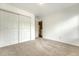 Cozy bedroom featuring neutral carpeting, and a closet for ample storage space at 708 Professor Dr, Ladson, SC 29456