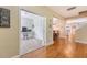 Office room showcases French doors, plush carpet, and ample natural light, creating a comfortable work-from-home space at 708 Professor Dr, Ladson, SC 29456