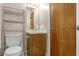 Modest bathroom features neutral tones, standard fixtures, and storage shelving at 7920 Parklane Ct # 608, North Charleston, SC 29418