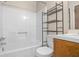 Full bathroom features a standard white tub, toilet, and vanity with shelving at 7920 Parklane Ct # 608, North Charleston, SC 29418