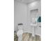 Charming half-bathroom with pedestal sink and modern fixtures at 86 Red Bluff St, Summerville, SC 29483