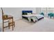 Light-filled bedroom with a makeup table and two accent chairs, creating a serene space at 86 Red Bluff St, Summerville, SC 29483
