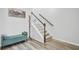 Entryway featuring a staircase, bench, and contemporary decor at 86 Red Bluff St, Summerville, SC 29483