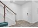 Staircase featuring white railings and stained wood accents at 86 Red Bluff St, Summerville, SC 29483