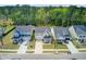 Attractive street view showcasing well-maintained homes with inviting front porches at 86 Red Bluff St, Summerville, SC 29483
