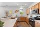 Modern kitchen featuring stainless steel appliances, quartz countertops, and ample cabinet space at 8961 N Red Maple Cir, Summerville, SC 29485