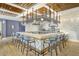 Modern bar with granite countertops, stylish seating, wooden ceilings, and decorative details at 9 Marsh Island Ln, Isle of Palms, SC 29451