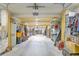 Spacious garage offering ample storage space with an automatic door and room for multiple cars at 9 Marsh Island Ln, Isle of Palms, SC 29451